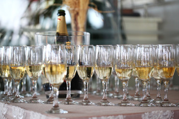 Table with glasses with champagne