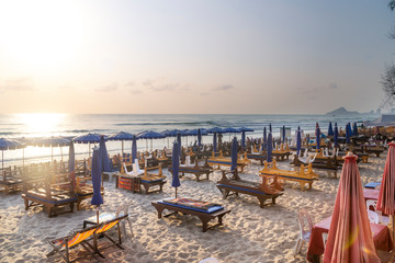 A row of sunbeds at morning in Hua Hin beach,Thailand.