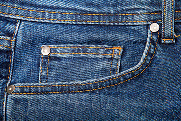 Fashionable clothes.  Jeans on a  background.