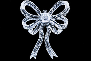 Christmas toys for tree bow-knot on a black background 