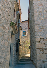 Blue window on a old stone house
