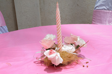 pink candle and flowers
