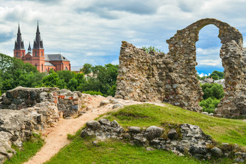 Old stone ruins of an ancient church. Latvian landscape