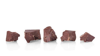 Pieces of black delicious chocolate isolated on white
