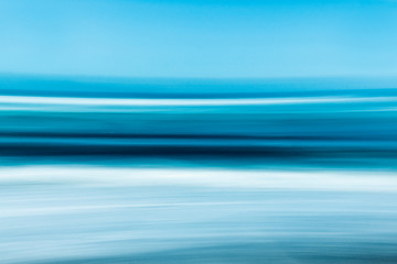 Abstract seascape with blurred panning motion, bright blue color