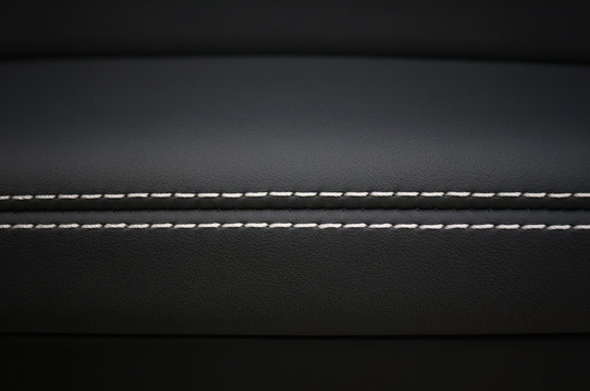 Car leather background. Interior detail.