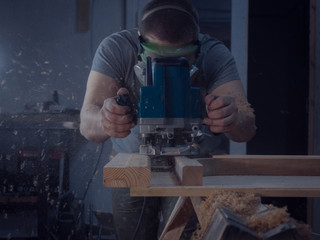 Milling. Carpenter working for the machine.