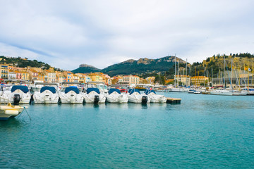 Fototapeta na wymiar Editorial illustrative. Cassis Provence France. February 03.2019. Empty boats and yachts in the port of Cassis in winter.