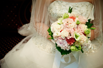 bride with wedding bouquet