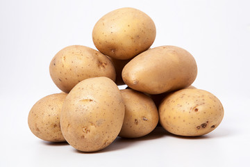  Potatoes on the white background.
