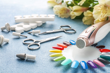 Tools for professional pedicure on color background