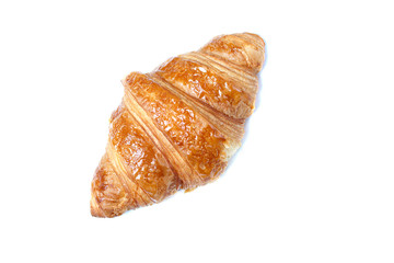 Fresh croissant close up isolated on white background, top view