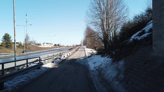 Footage of bicycle walking road path in Seinajoki, Finland. Sunny spring weather.