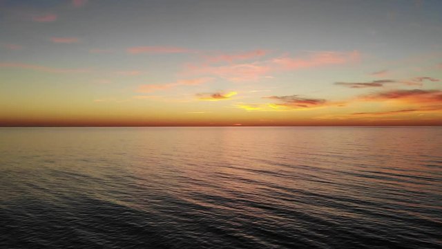 Static and calm drone shot of the Atlantic Ocean in "Le Porge" FRANCE  /  time : sunset