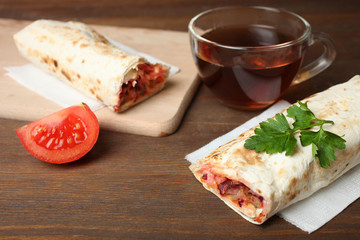 Doner kebab, shawarma and cup of black tea