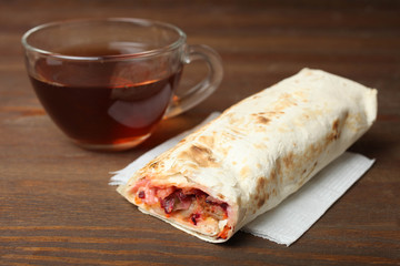 Doner kebab, shawarma and cup of black tea