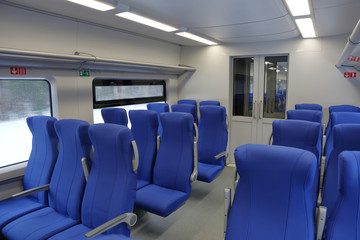 Comfortable soft seats in a high-speed express train car