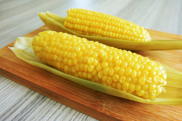 Boiled corns on wood table