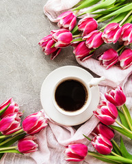 Cup of coffee and tulips