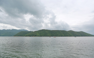 Landscape view of the lake with mountain at kanchanaburi, Thailand.