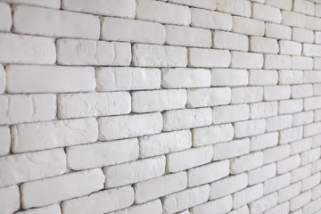Perspective of white brick wall for texture background.