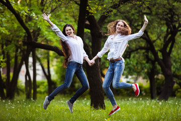 Fototapeta premium Sisters in the same clothes