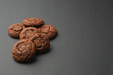 Chocolate cookies on black background
