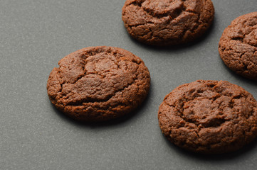 Chocolate cookies on black background