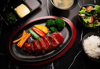 meat and vegetables in pan