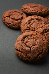 Chocolate cookies on black background