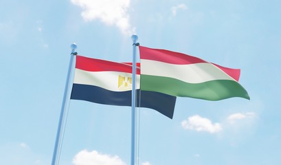 Fototapeta na wymiar Hungary and Egypt, two flags waving against blue sky. 3d image