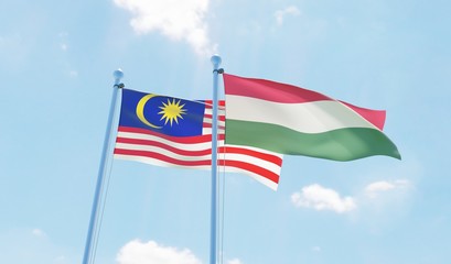 Hungary and Malaysia, two flags waving against blue sky. 3d image