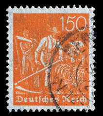 Stamp printed in Germany shows Reaper, Definitives series, circa 1921.