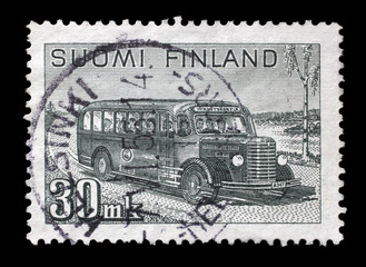 Stamp printed in Finland shows retro postal bus with passengers on rural road, series 