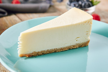 Classic Plain New York Cheesecake on Blue Plate
