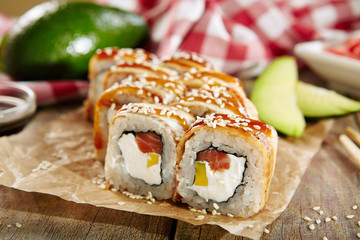 Salmon and Smoked Eel Sushi Roll with Pickled Daikon