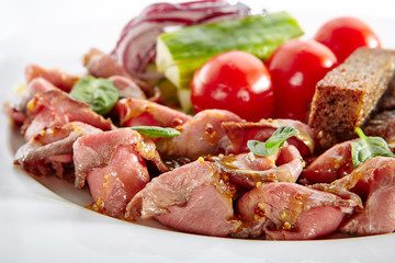 Spicy Roast Beef with Fresh Vegetables Isolated