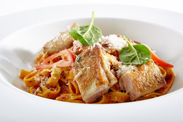 Homemade Tagliatelle Pasta with Crispy Chicken Isolated