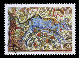 Stamp issued in Yugoslavia shows the bull near the cherry tree, mosaic series, circa 1970.