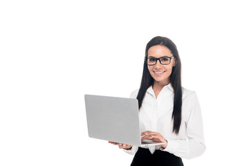 Elegant businesswoman in glasses using laptop isolated on white