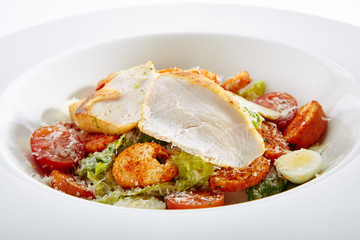 Caesar Salad with a Crispy Chicken Isolated