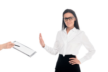 Dissatisfied businesswoman in glasses refusing to sign contract isolated on white
