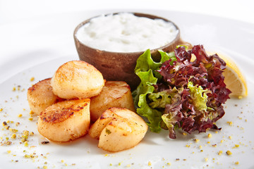 Fried Sea Scallop with White Sauce Isolated