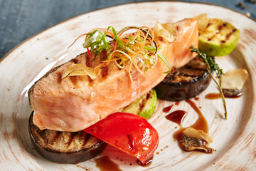 Grilled Salmon Steak or Red Fish Fillet on Bbq Vegetables