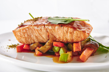 Salmon Steak with Warm Vegetables Salad