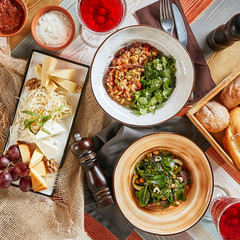 Vegetable Salad, Green Mix, Cheese Plate and Chickpeas Top View