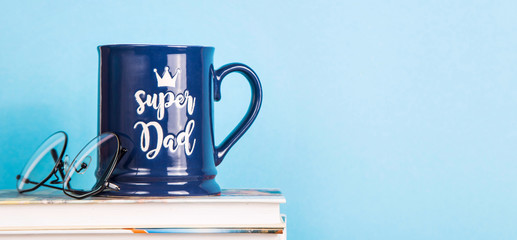 Men's accessory gift for Father's Day - a blue cup with the inscription