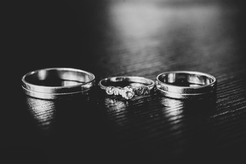 Wedding engagement rings. Love concept.Selective focus. Black and white photo with highlights