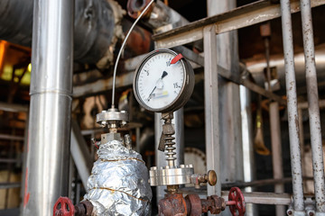 properly working pressure gauge installed on the pipeline at the old chemical plant