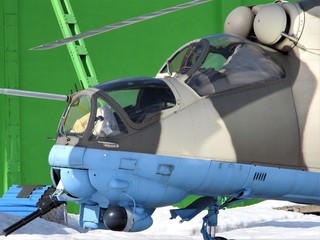 Fototapeta premium Military helicopter, propellers, installations and units for shooting, close-up.